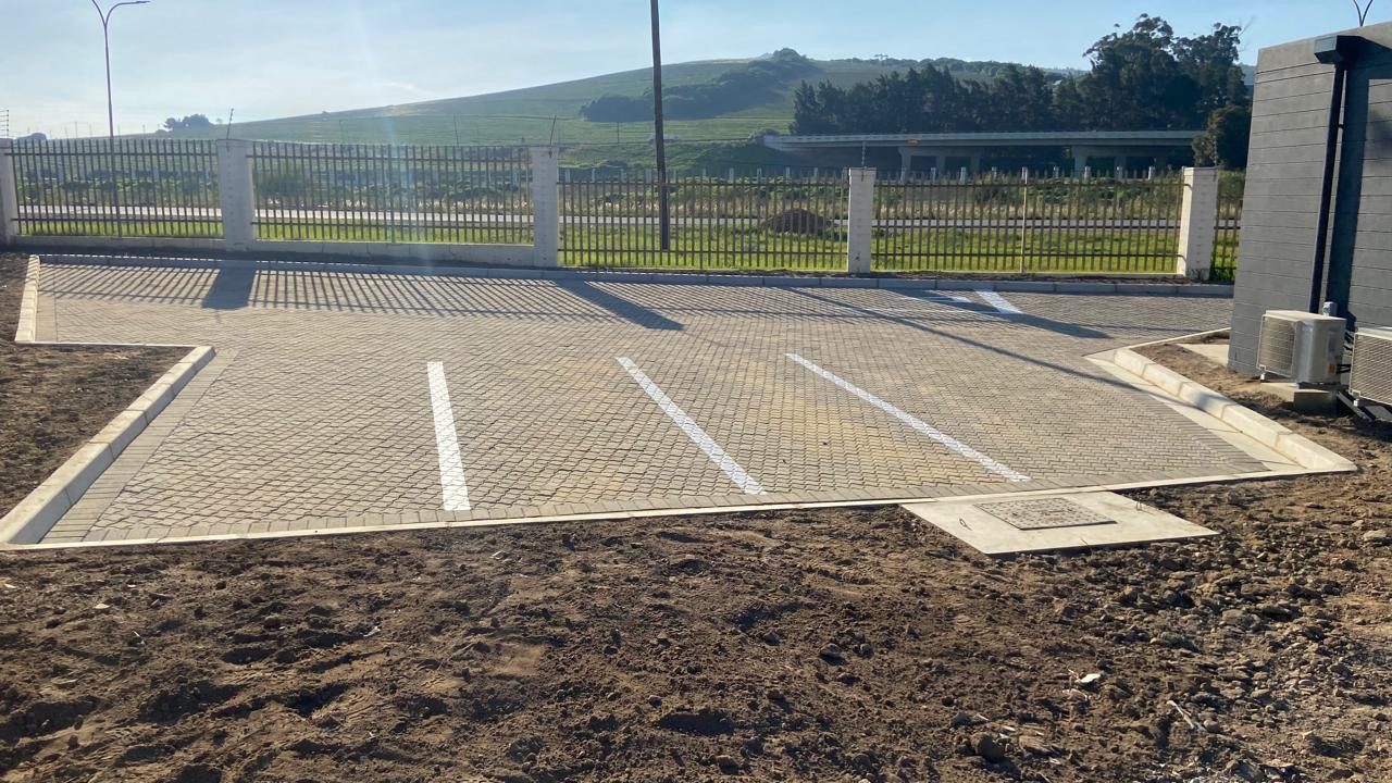 Line-marked parking bays laid in interlocking pavers