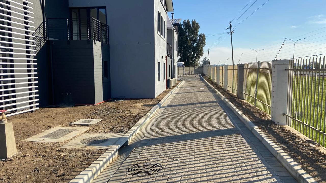Service road with drainage channel